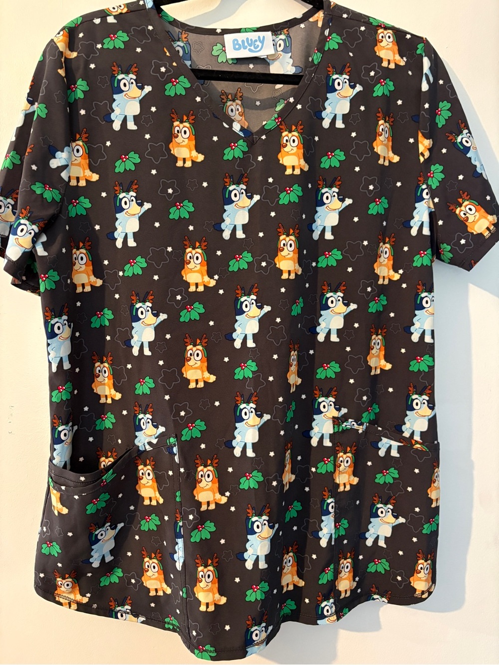 Christmas Inspired Black Short Sleeve Scrub Top by Bluey